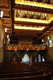Vue de la nef en direction de l'orgue (avec les peintures d'A. Cingria). Cliché personnel