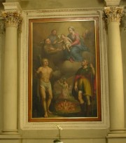 Un tableau: Madonna col Bambino e i Santi Sebastiano e Rocca (1825). Cliché personnel