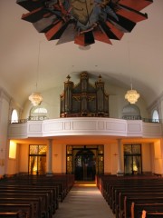 Vue axiale de la nef en direction des orgues Mooser. Cliché personnel